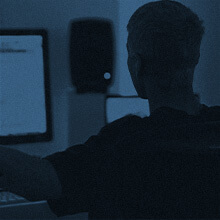 Harbinger Man at Computer Black and White